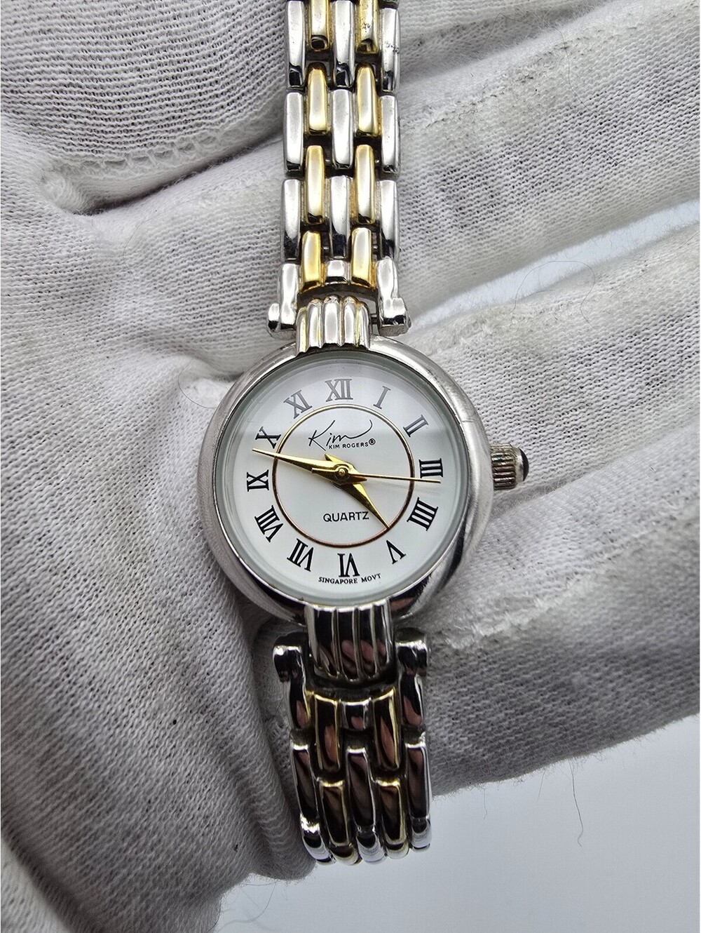 Kim Rogers Women’s Quartz Analog Wristwatch Two-Tone Bracelet White Roman Dial